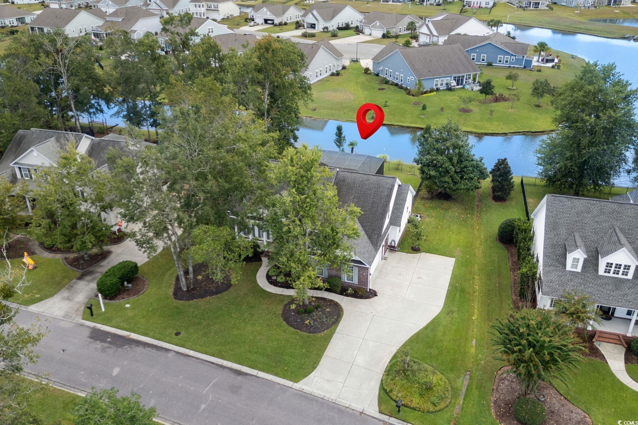 613 Broad River Road Myrtle Beach, SC 29588 - Photo 3 of 40 Aerial perspective of suburban area featuring a nearby body of water