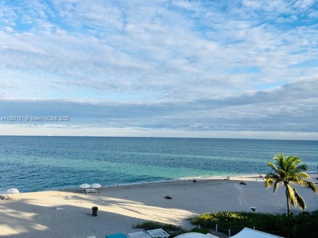 18001 Collins Avenue, Unit 2209 Sunny Isles Beach, FL 33160 - Photo 2 of 27 a view of a yard with an ocean view