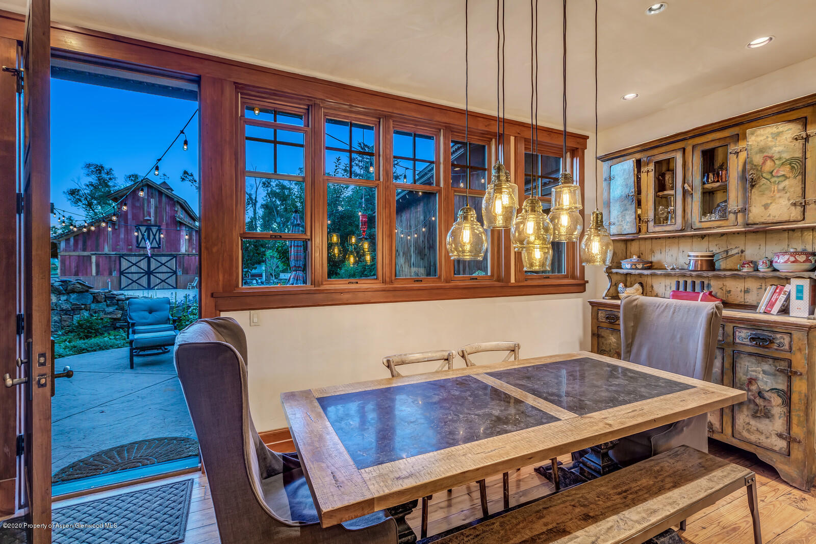 160 Red Rock Road Basalt, CO 81621 - Photo 11 of 45 a dinning table sitting in a room next to a window