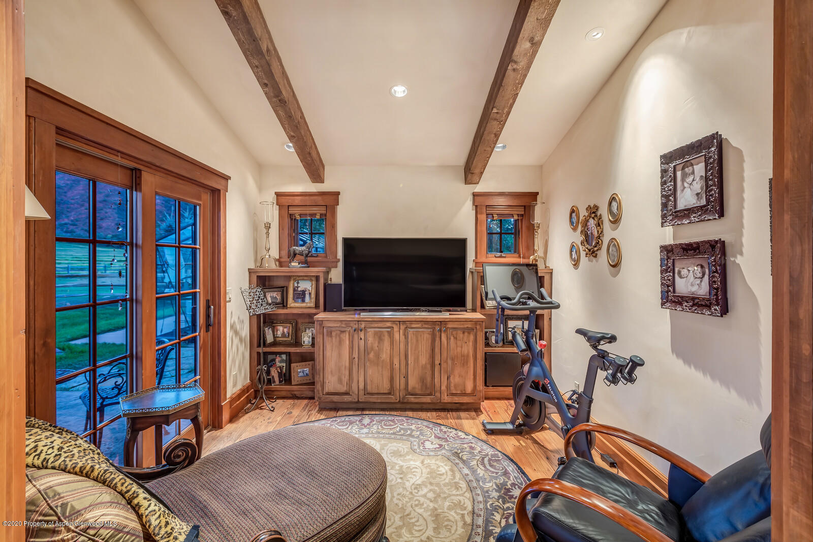 160 Red Rock Road Basalt, CO 81621 - Photo 12 of 45 a living room with furniture and a flat screen tv