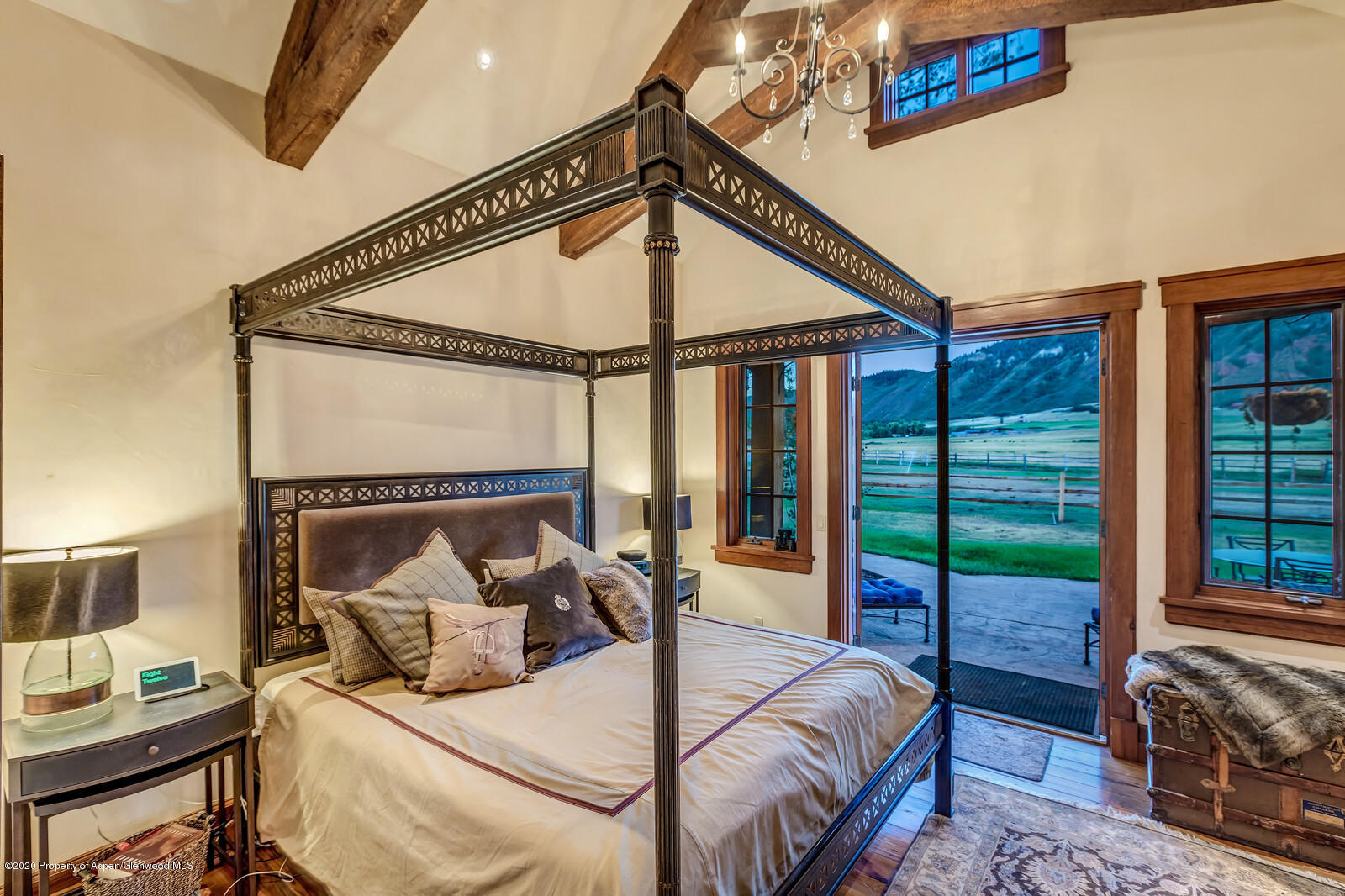 160 Red Rock Road Basalt, CO 81621 - Photo 13 of 45 a bed room with a bed and a window