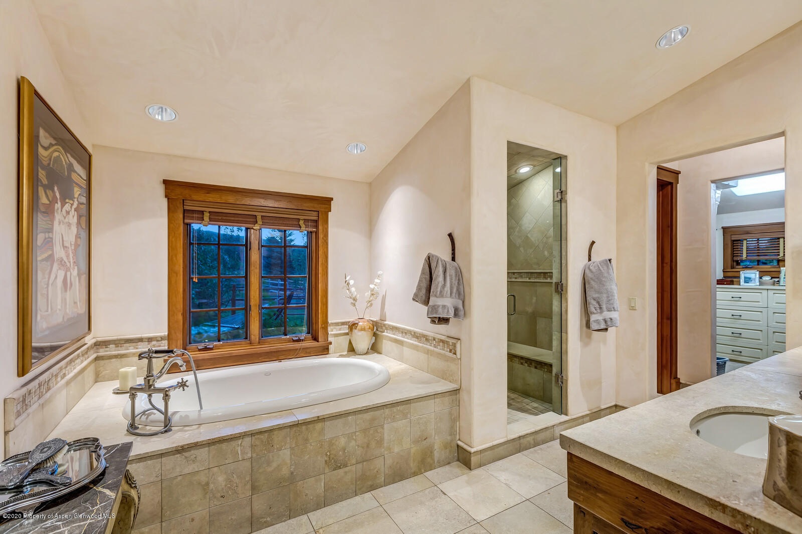 160 Red Rock Road Basalt, CO 81621 - Photo 15 of 45 a spacious bathroom with a tub and sink