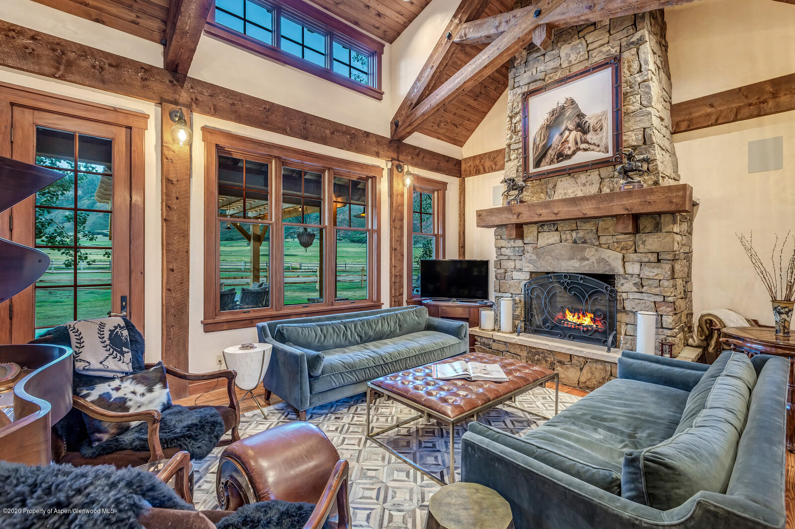 160 Red Rock Road Basalt, CO 81621 - Photo 2 of 45 a living room with furniture fireplace and window