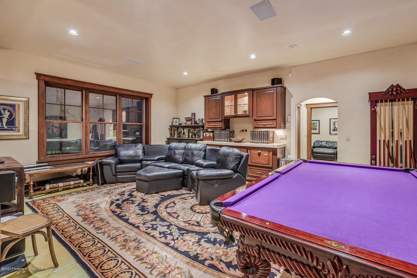 160 Red Rock Road Basalt, CO 81621 - Photo 23 of 45 a living room with furniture a flat screen tv and a table