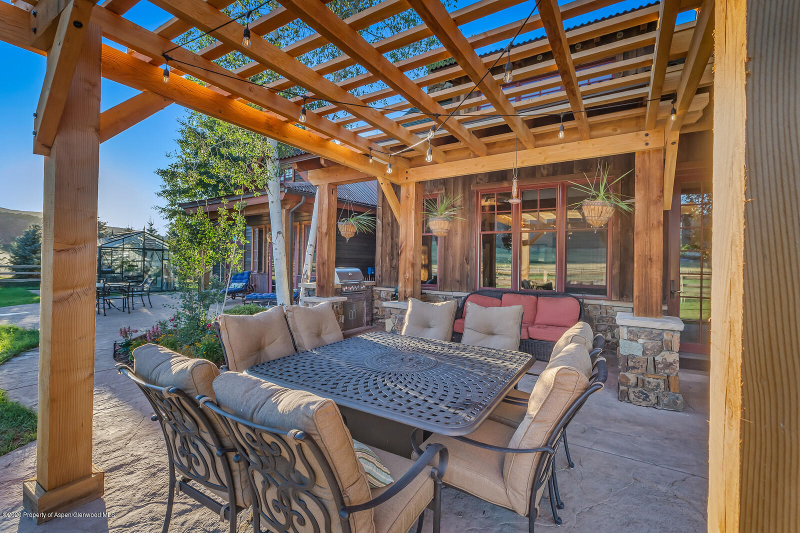 160 Red Rock Road Basalt, CO 81621 - Photo 27 of 45 a view of a patio with a table and chairs