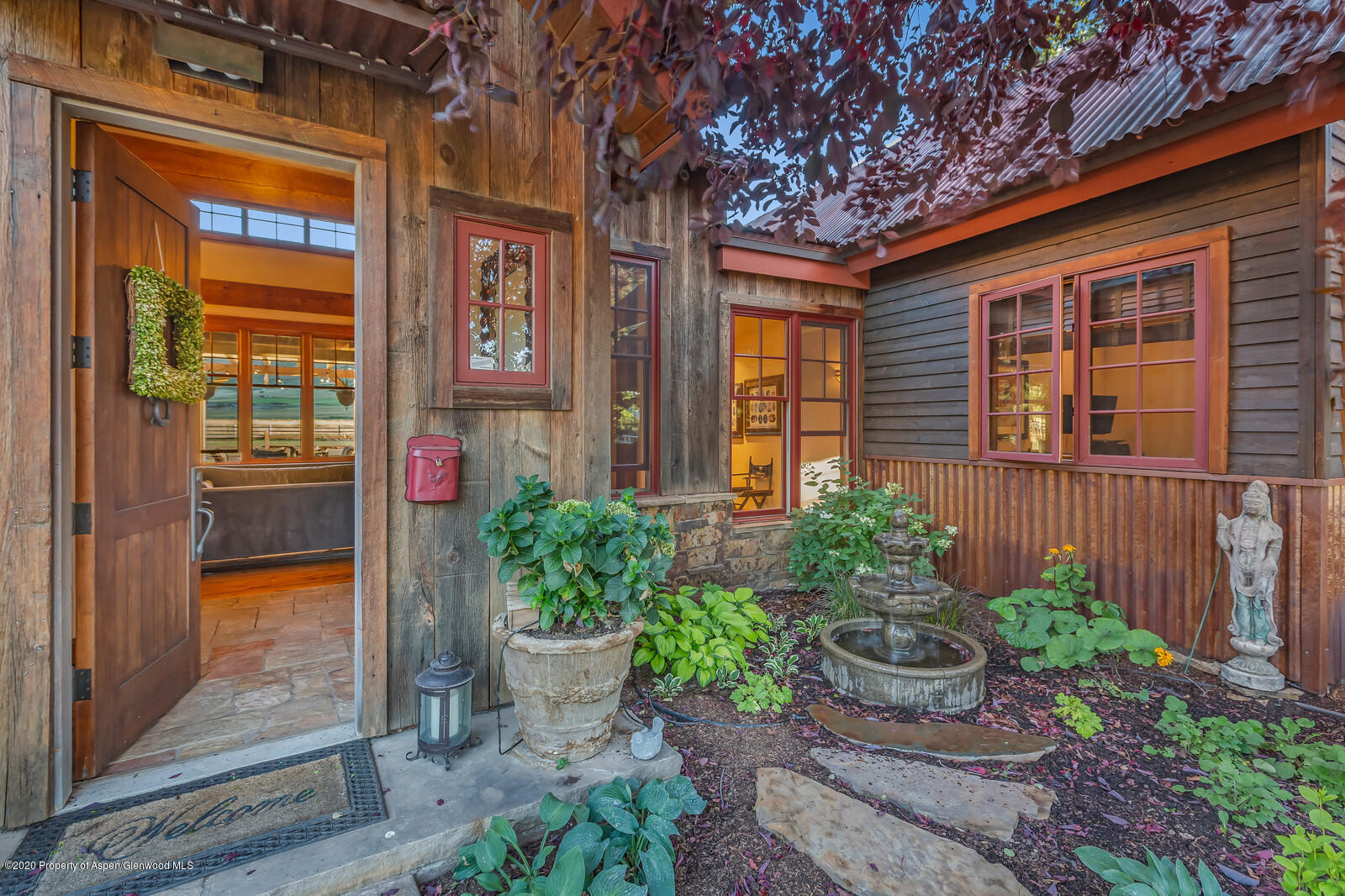 160 Red Rock Road Basalt, CO 81621 - Photo 29 of 45 a front view of a house with a garden