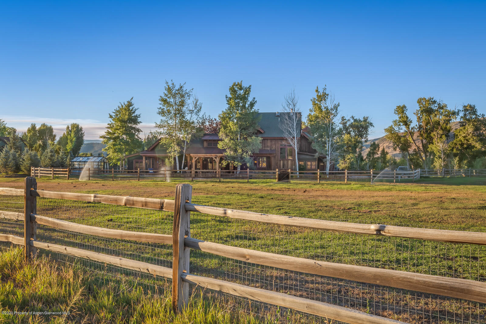 160 Red Rock Road Basalt, CO 81621 - Photo 31 of 45 a view of a swimming pool with a lawn chairs