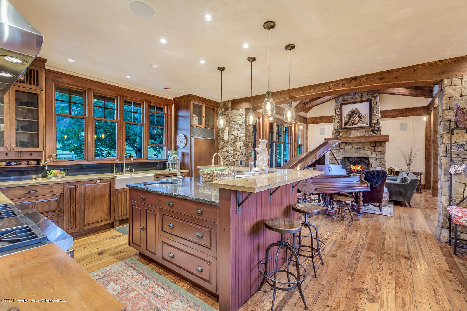 160 Red Rock Road Basalt, CO 81621 - Photo 4 of 45 a open kitchen with stainless steel appliances granite countertop a stove and cabinets