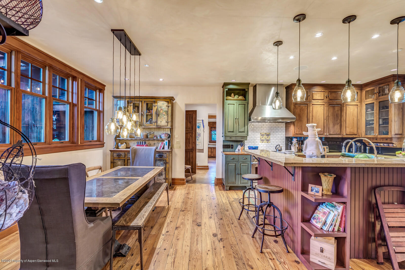 160 Red Rock Road Basalt, CO 81621 - Photo 5 of 45 a open kitchen with stainless steel appliances granite countertop a stove a sink dishwasher and a dining table with wooden floor
