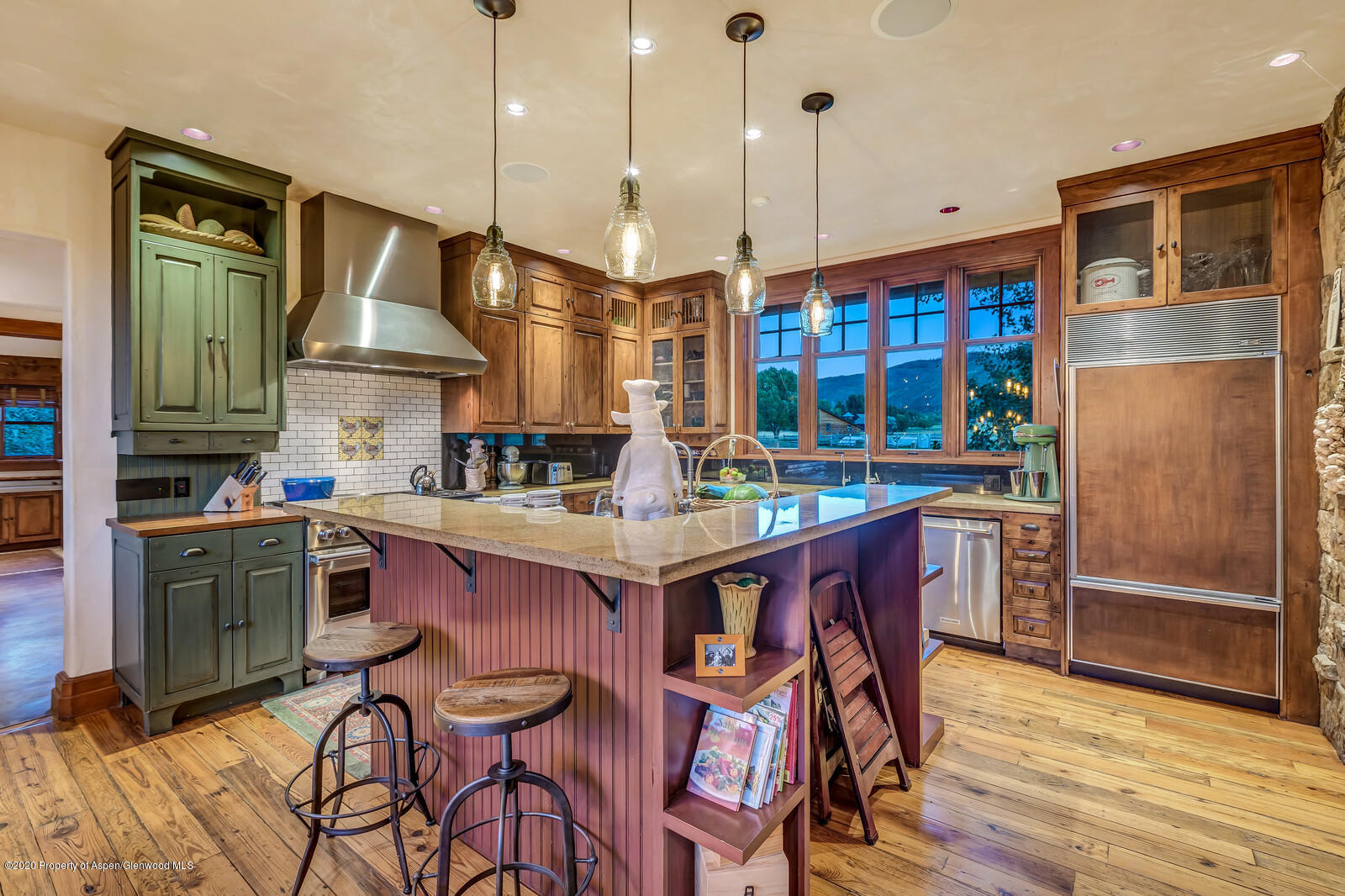 160 Red Rock Road Basalt, CO 81621 - Photo 9 of 45 a kitchen with stainless steel appliances granite countertop a stove a sink dishwasher and a refrigerator with wooden floor