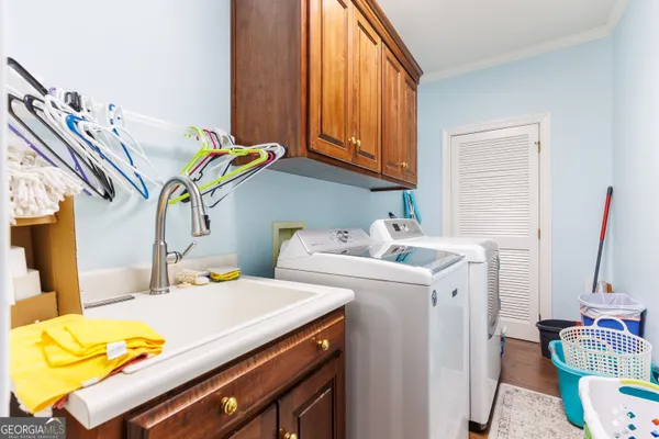a spacious bathroom with a sink a mirror and a toilet