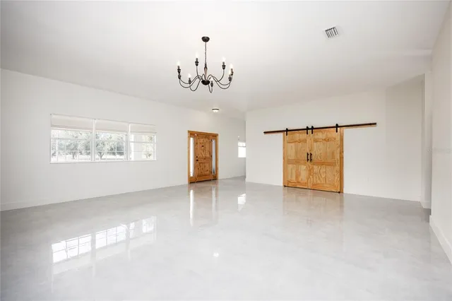 a bathroom with a shower sink and mirror