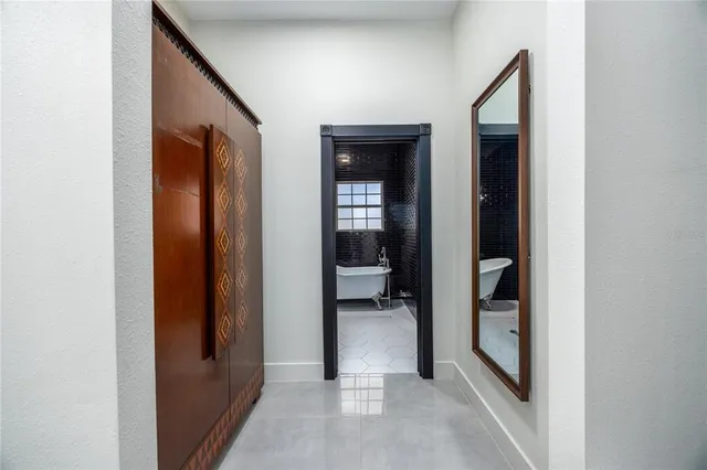 a view of dirt yard with a trees