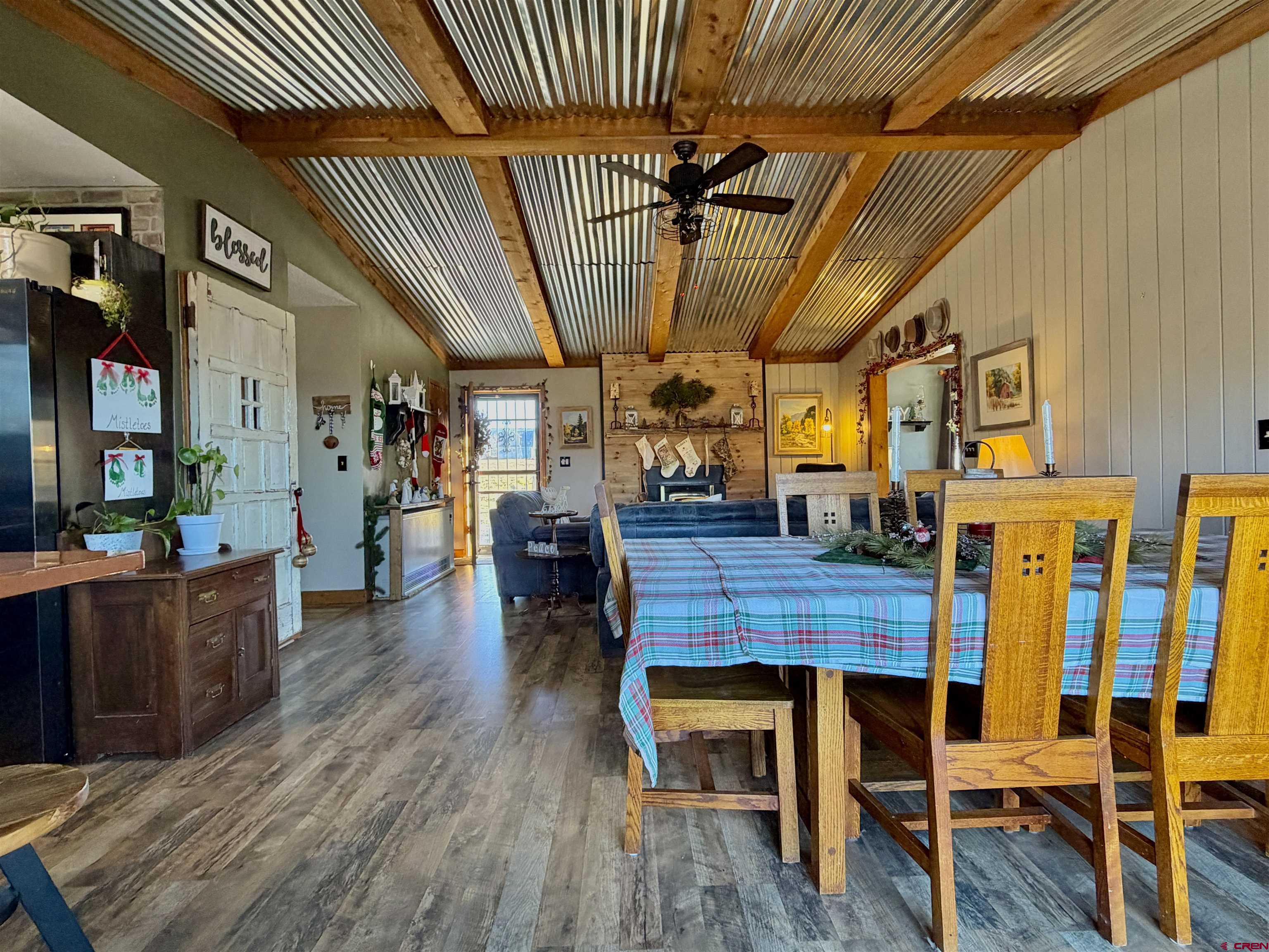 18377 Highway 65 Cedaredge, CO 81413 - Photo 14 of 45 a living room with furniture and wooden floor