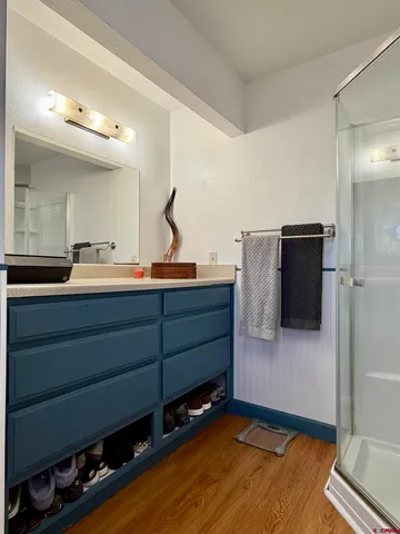 a room with a dresser and a mirror