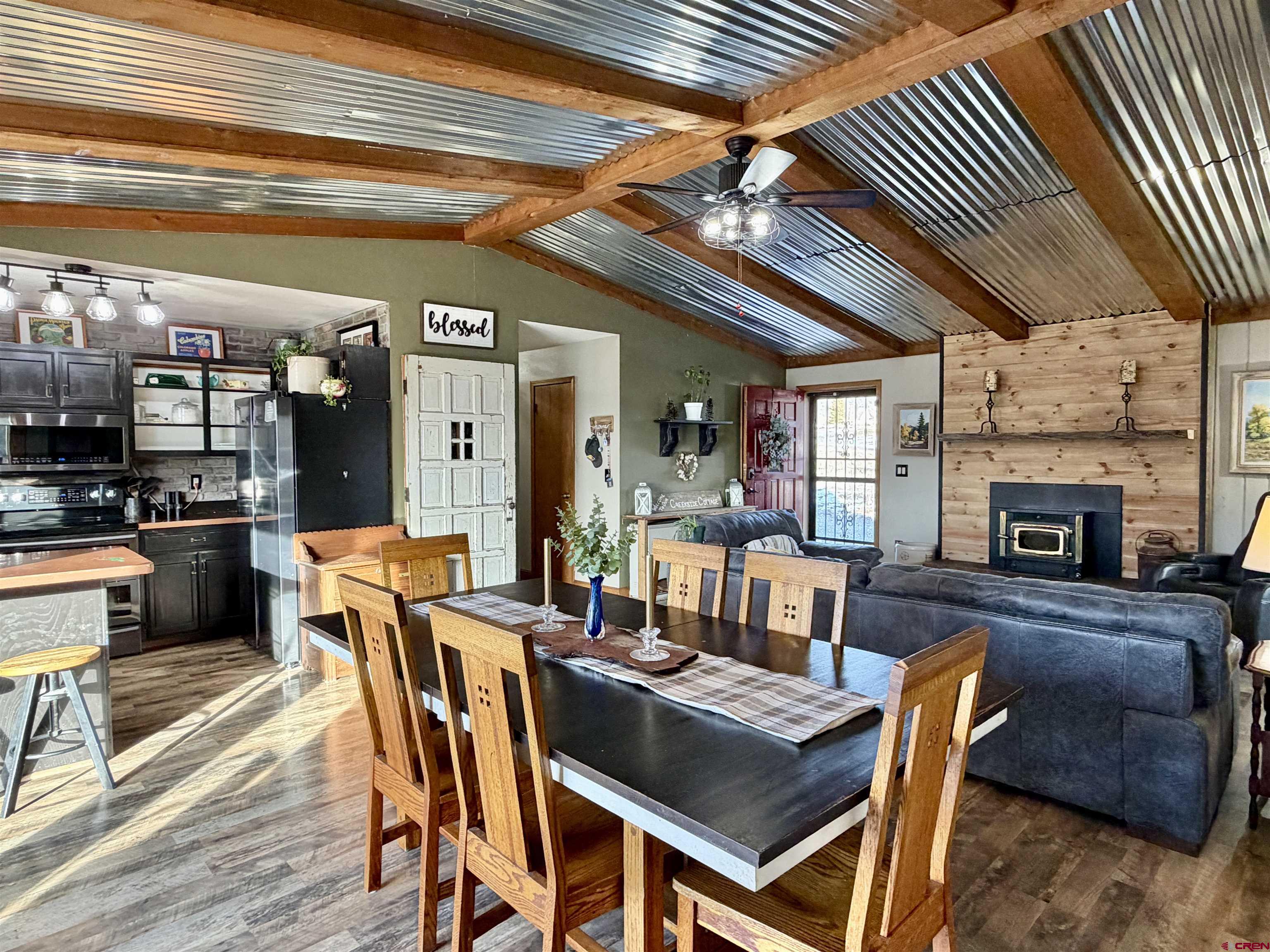 18377 Highway 65 Cedaredge, CO 81413 - Photo 7 of 45 a view of a dining room with furniture