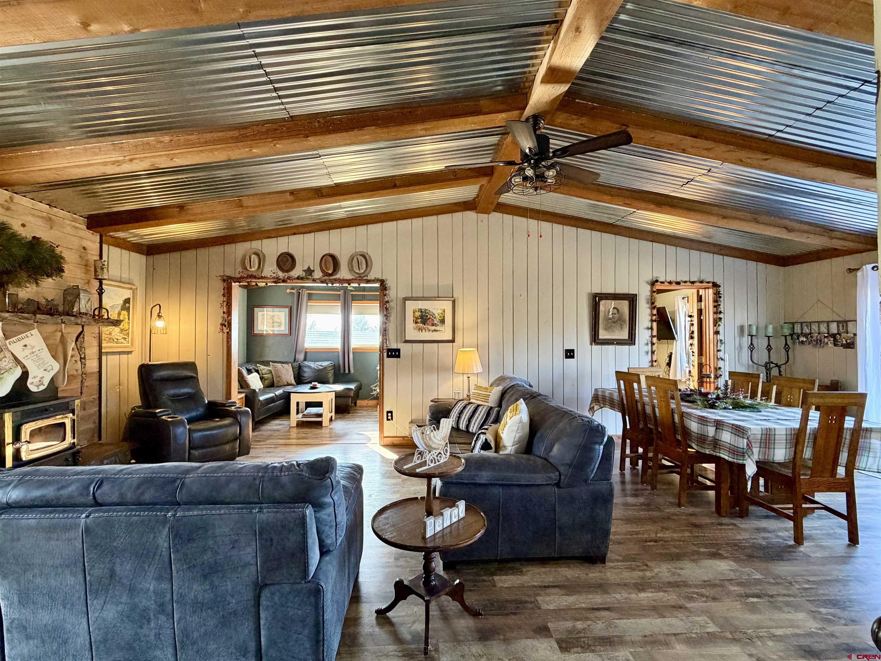 18377 Highway 65 Cedaredge, CO 81413 - Photo 9 of 45 a living room with furniture and wooden floor