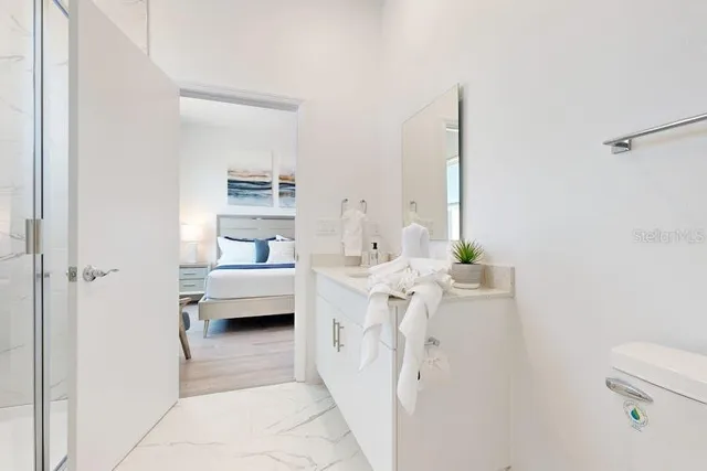 a en suite bathroom with a double vanity sink
