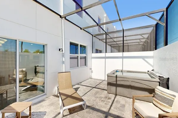 a building outdoor space with patio furniture