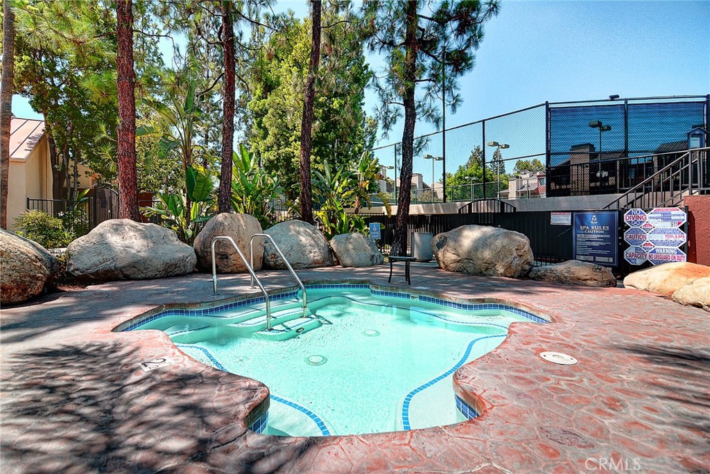 5510 Owensmouth Avenue, Unit 301 Woodland Hills, CA 91367 - Photo 13 of 22 a view of a backyard with couches chair and fire pit