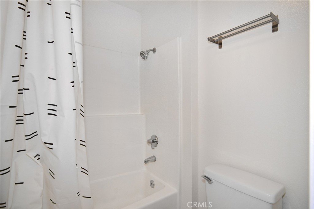 5510 Owensmouth Avenue, Unit 301 Woodland Hills, CA 91367 - Photo 10 of 22 a bathroom with a bathtub and shower