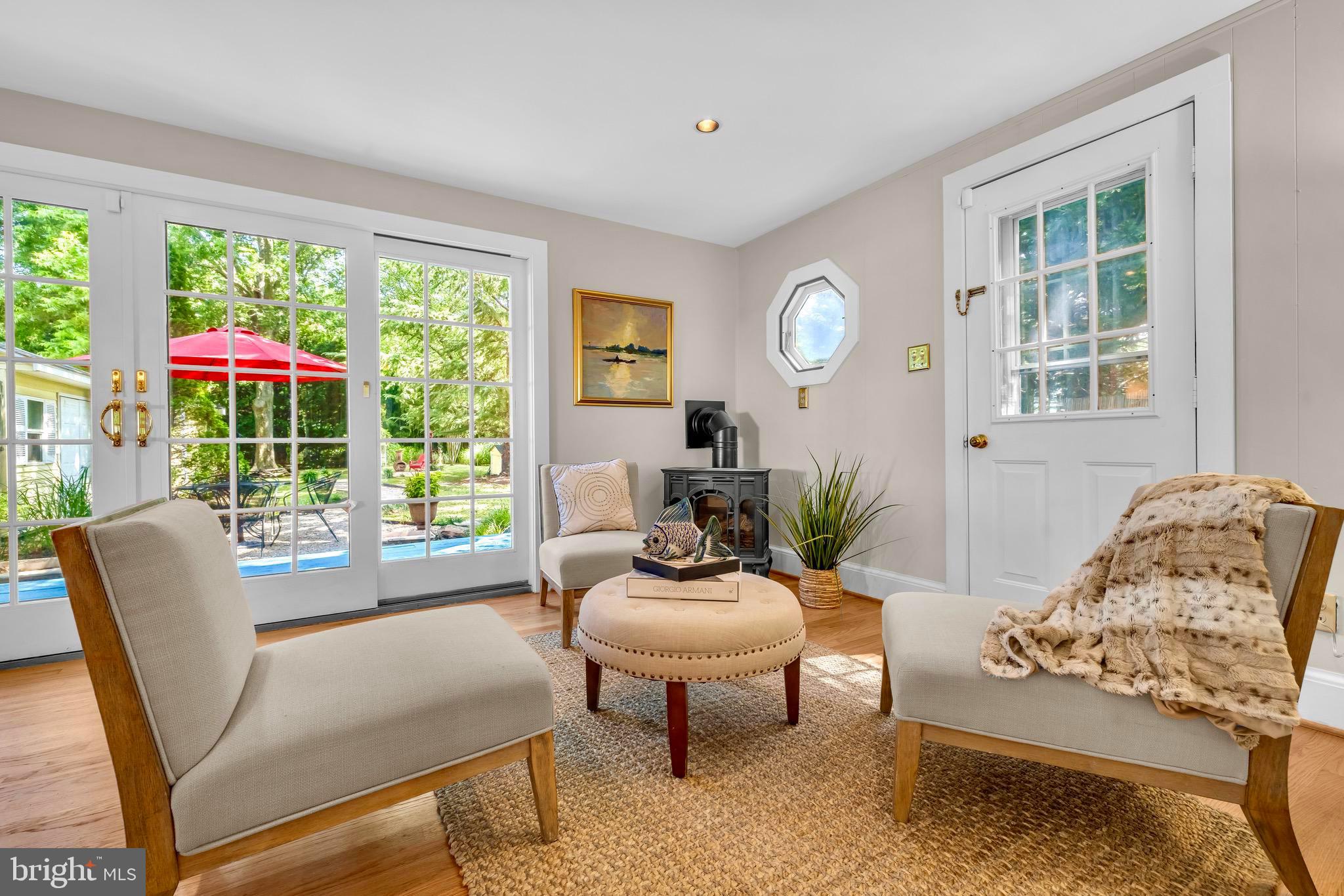 21424 Wharf Road Tilghman, MD 21671 - Photo 11 of 47 a living room with furniture and a large window