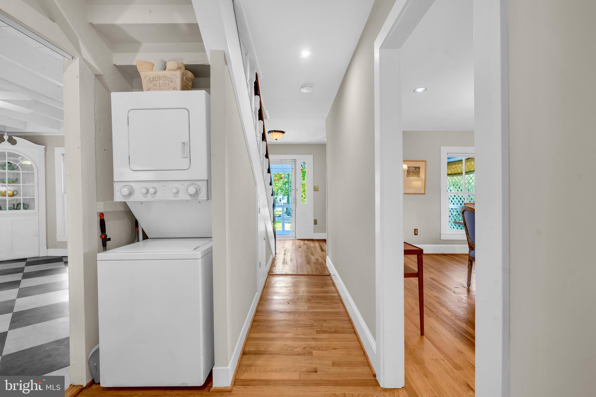 21424 Wharf Road Tilghman, MD 21671 - Photo 14 of 47 a view of a hallway with wooden floor and living space