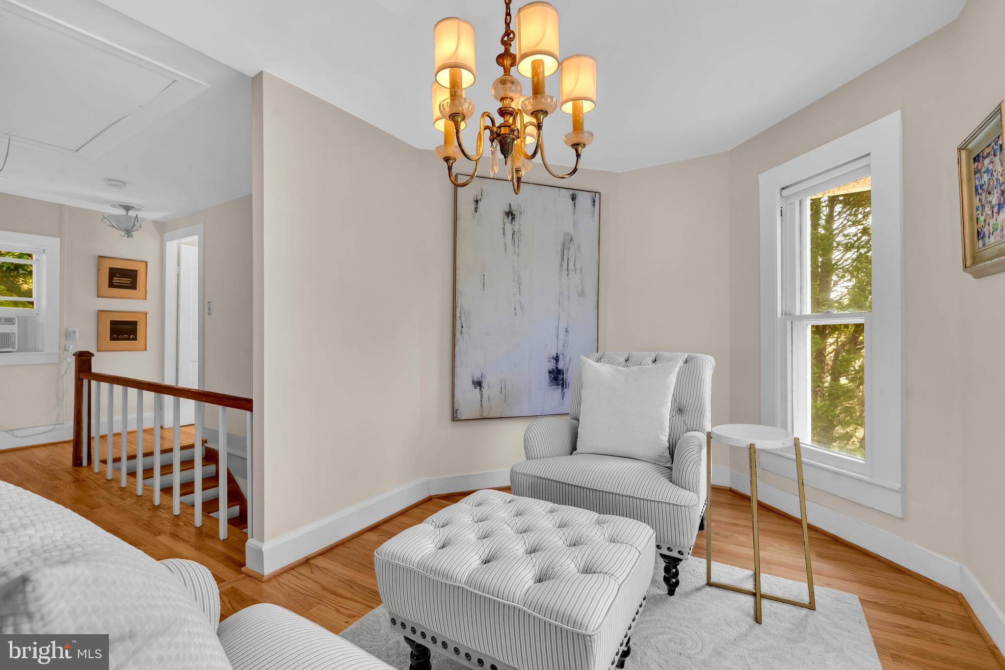 21424 Wharf Road Tilghman, MD 21671 - Photo 18 of 47 a bedroom with furniture and a window