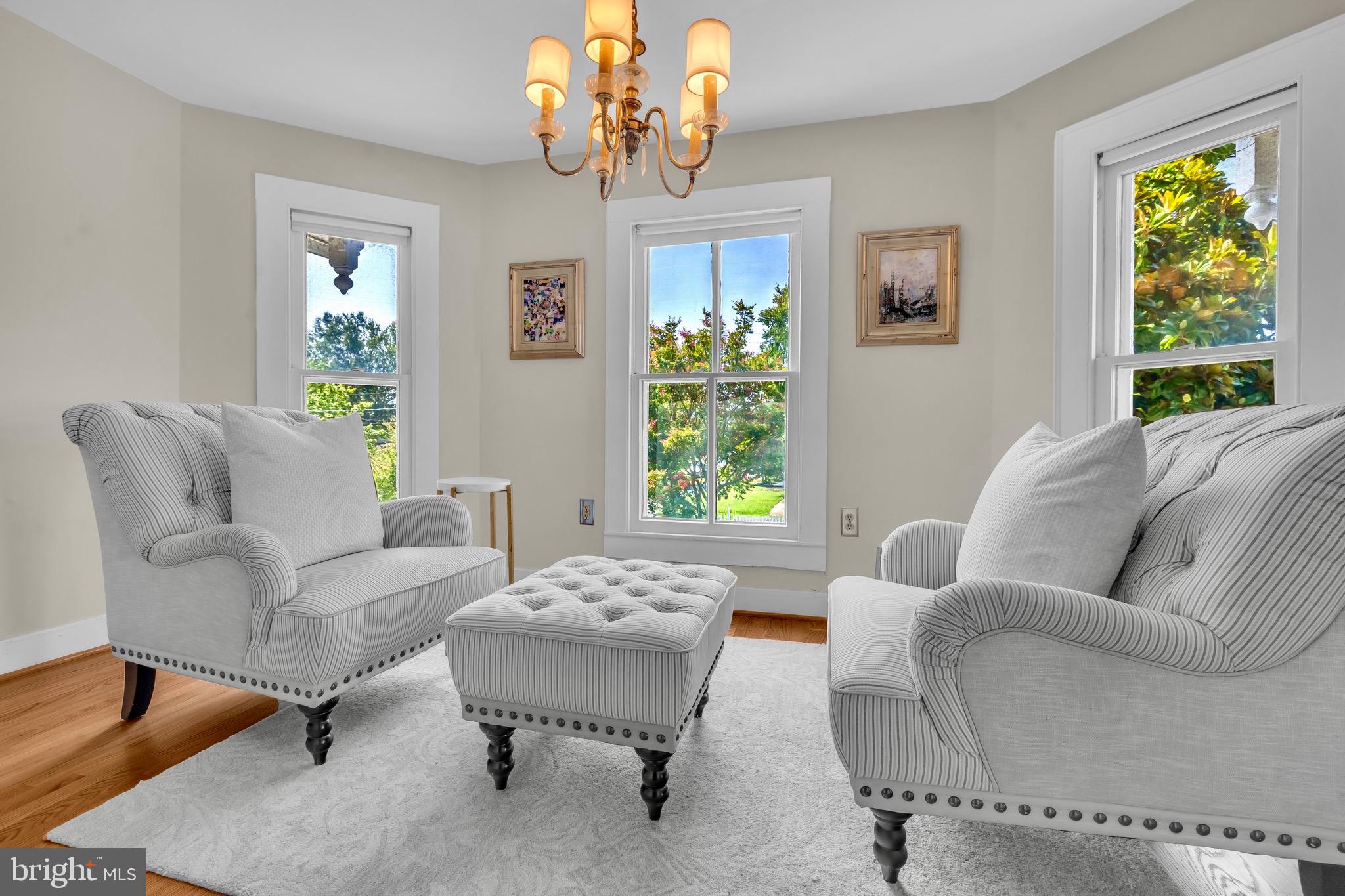 21424 Wharf Road Tilghman, MD 21671 - Photo 20 of 47 a living room with furniture and a large window
