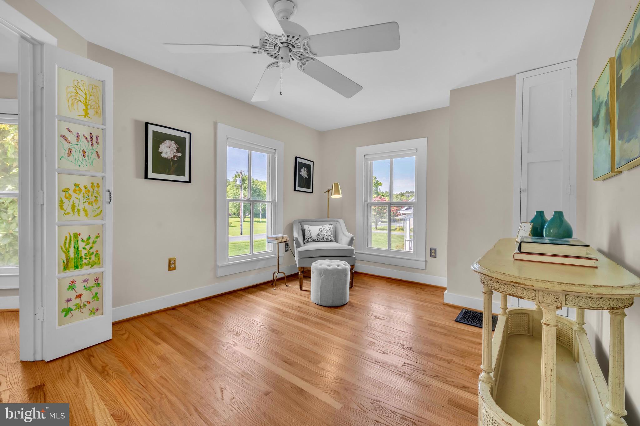21424 Wharf Road Tilghman, MD 21671 - Photo 23 of 47 a living room with furniture and a wooden floor