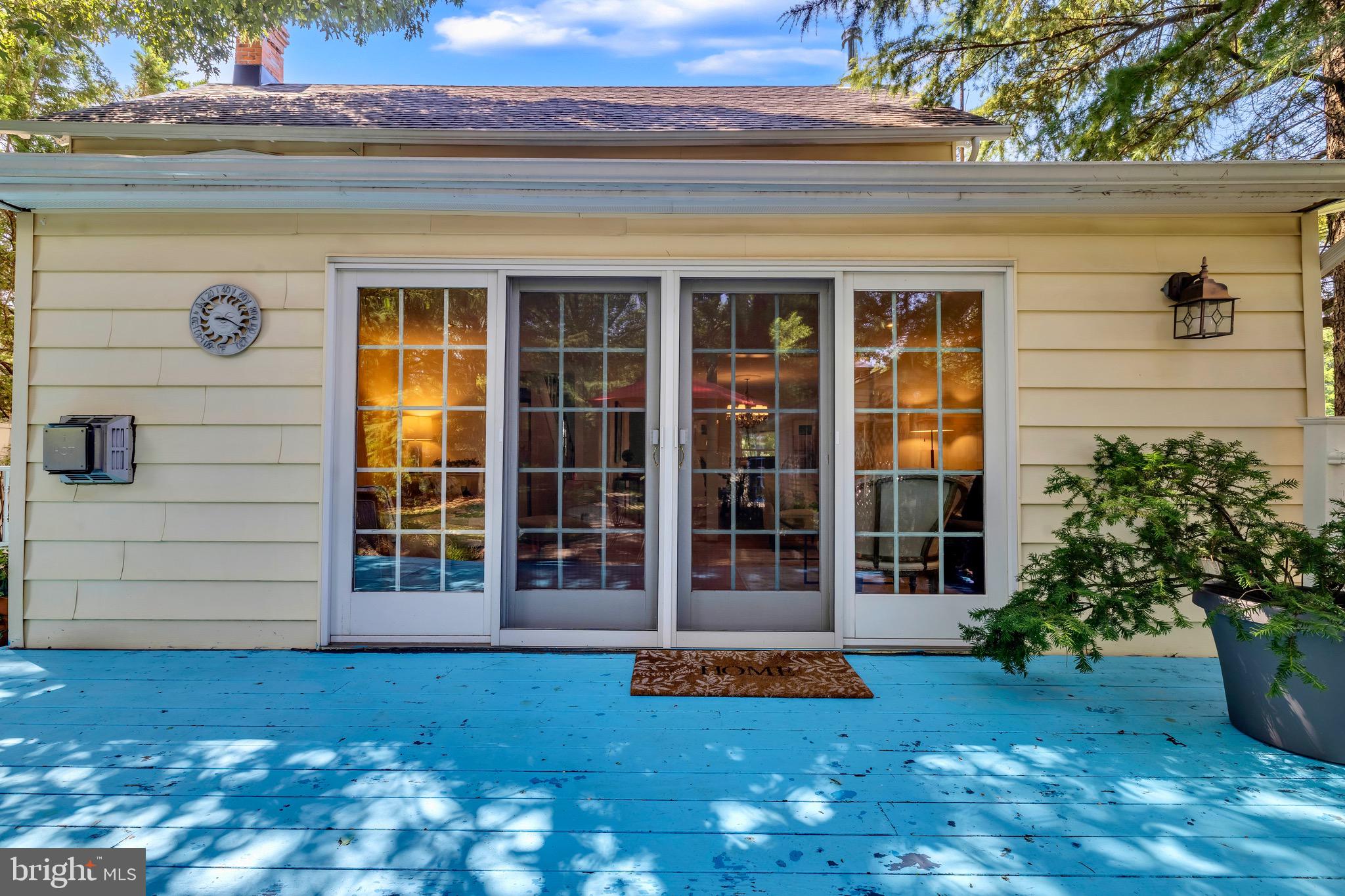 21424 Wharf Road Tilghman, MD 21671 - Photo 27 of 47 front view of a house with a yard