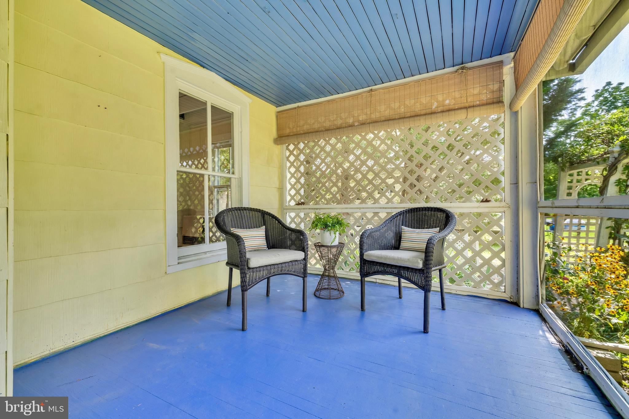 21424 Wharf Road Tilghman, MD 21671 - Photo 4 of 47 a living room with furniture and a window