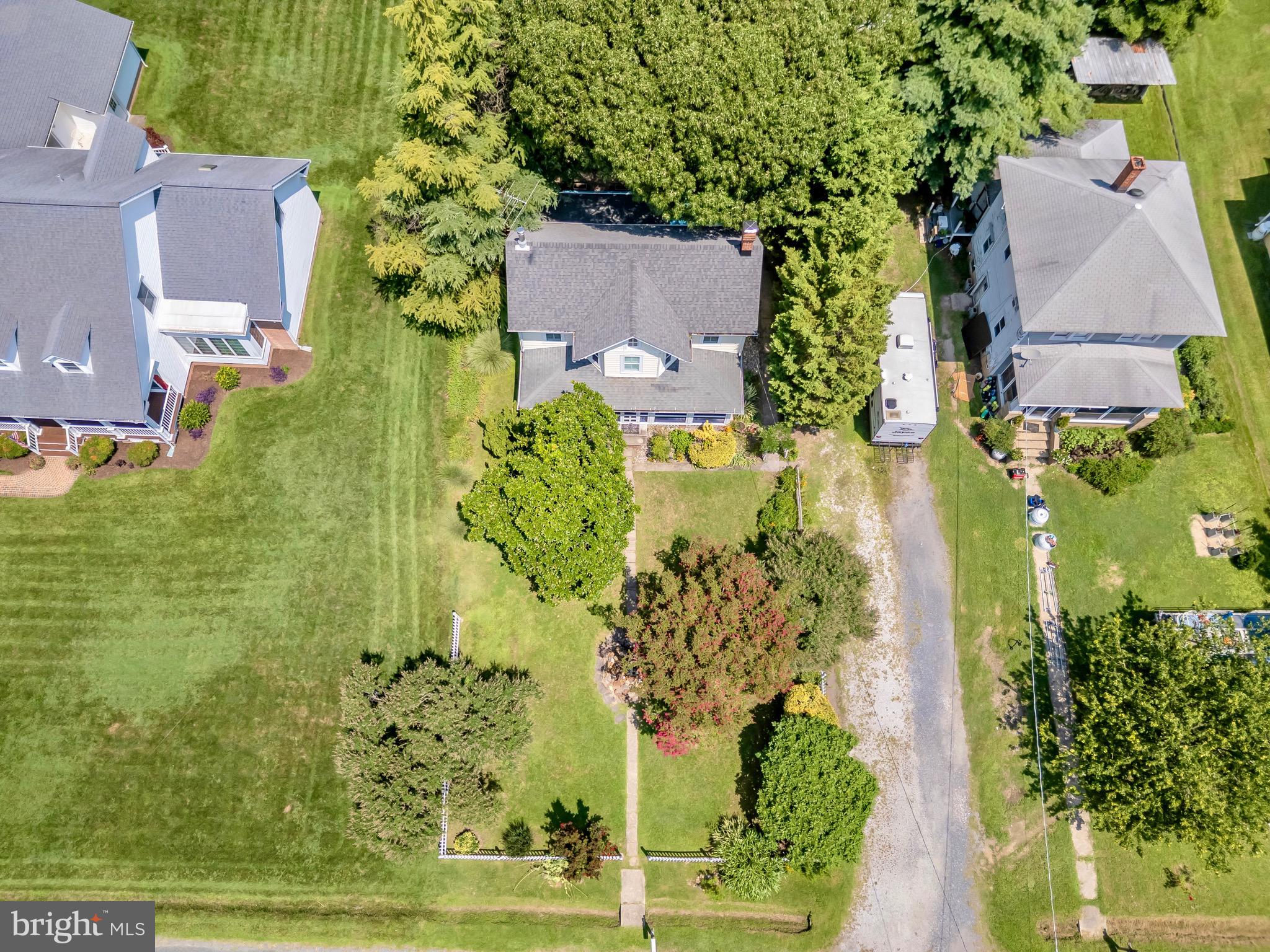 21424 Wharf Road Tilghman, MD 21671 - Photo 43 of 47 an aerial view of a house with a yard