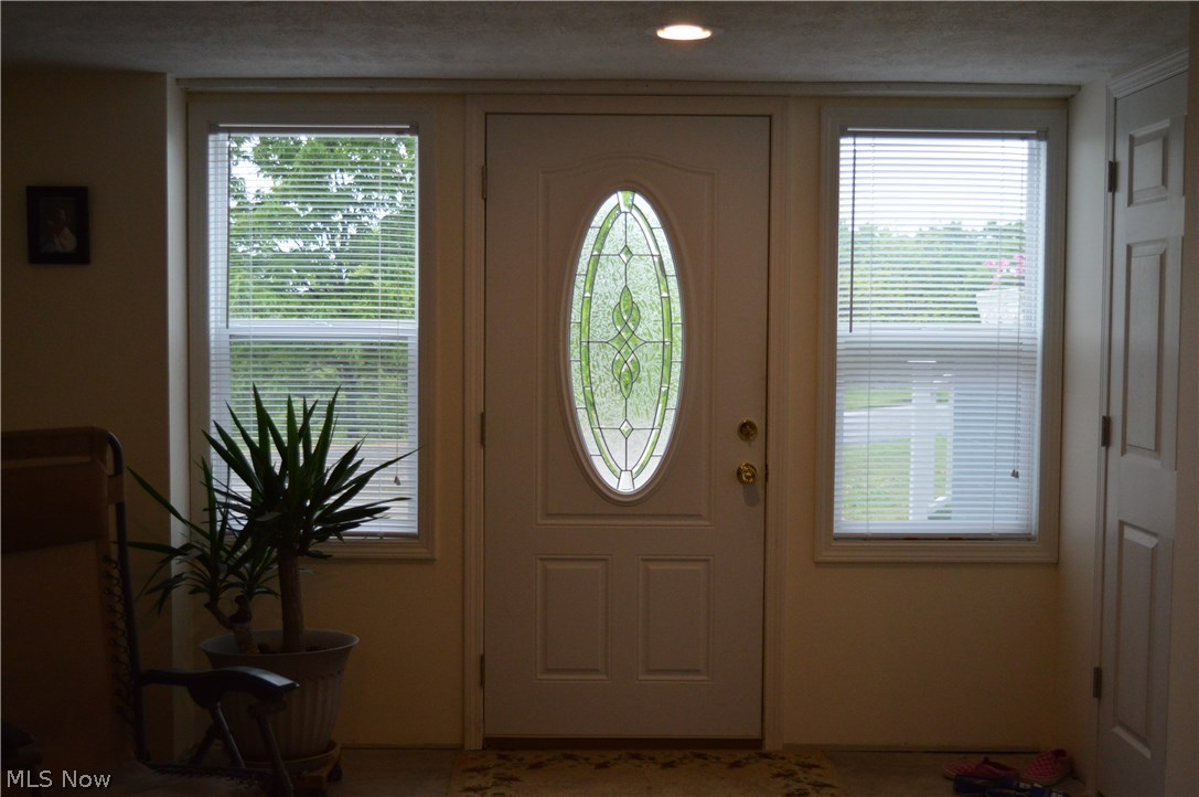 925 McGill Road Vincent, OH 45784 - Photo 15 of 24 Beautiful Outside entry to the Lower Level. Also stairs for inside access.