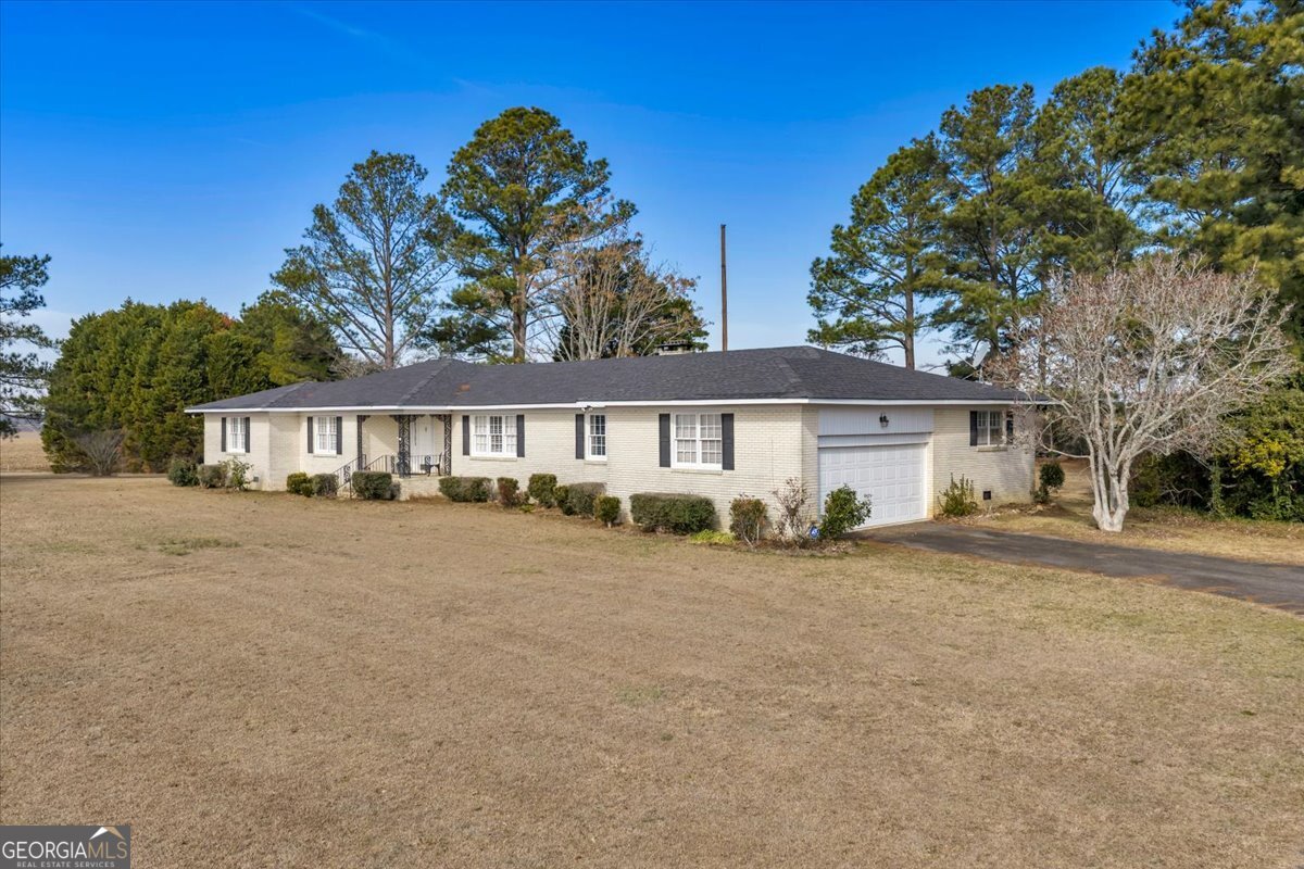 412 Red Dog Farm Road Cochran, GA 31014 - Photo 75 of 76 front view of a house with a big yard