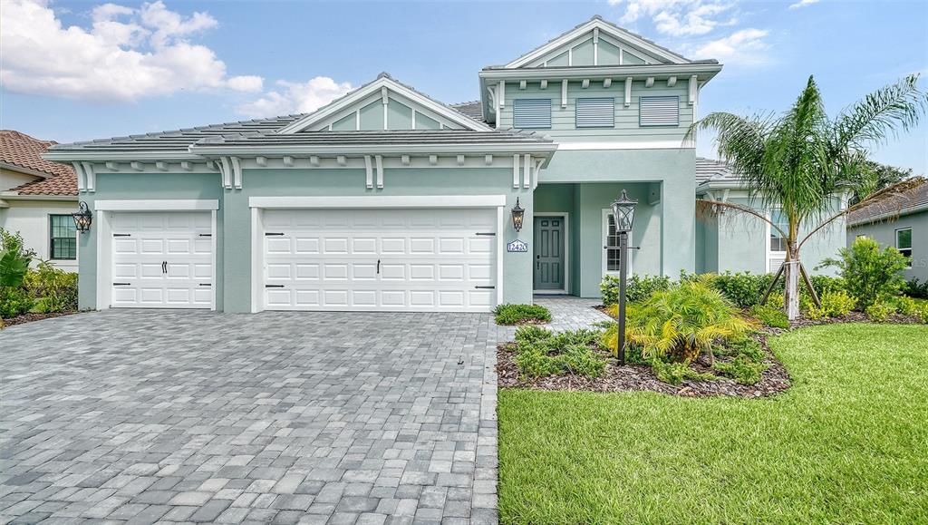 12420 Destin Loop Venice, FL 34293 - Photo 1 of 1 front view of a house with a yard