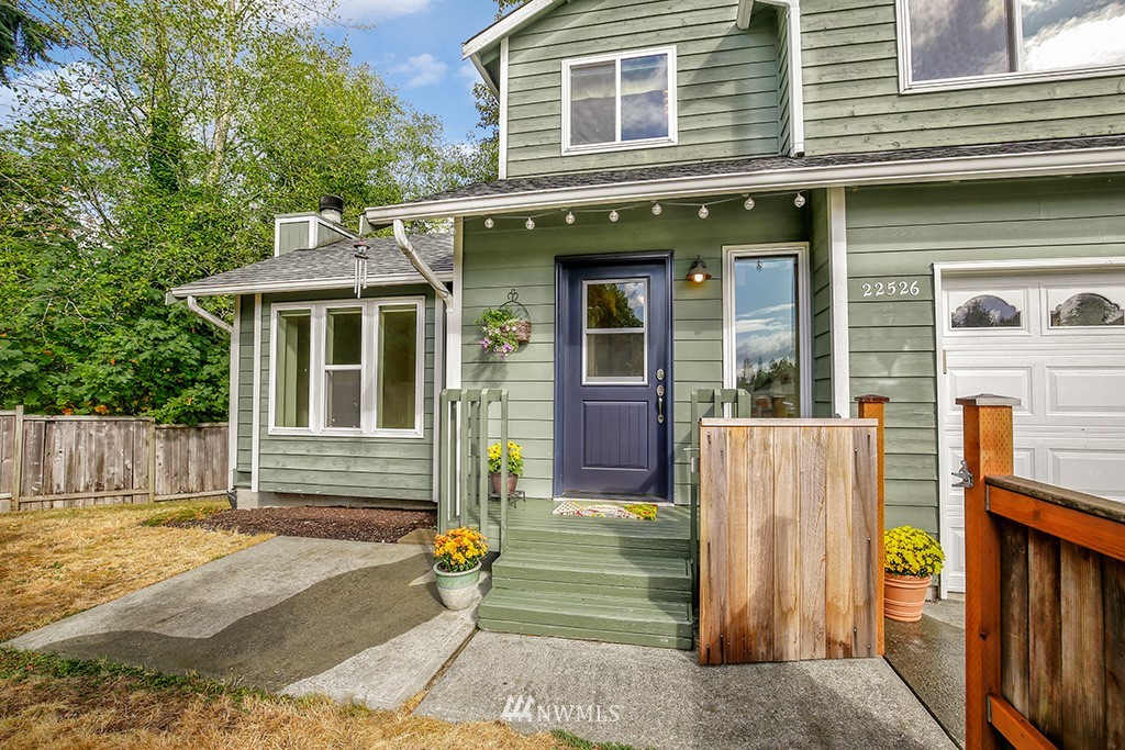 22526 14th Place West Bothell, WA 98021 - Photo 2 of 25 a view of brick house with large windows