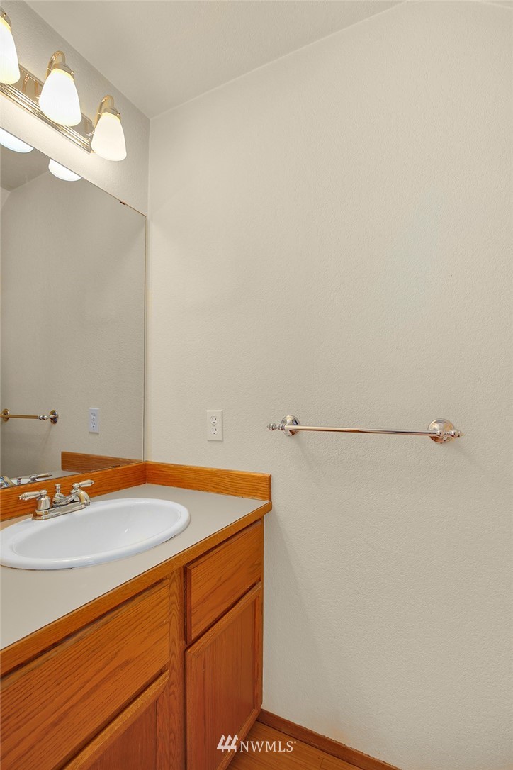 22526 14th Place West Bothell, WA 98021 - Photo 17 of 25 a view of a room with racks on the wall