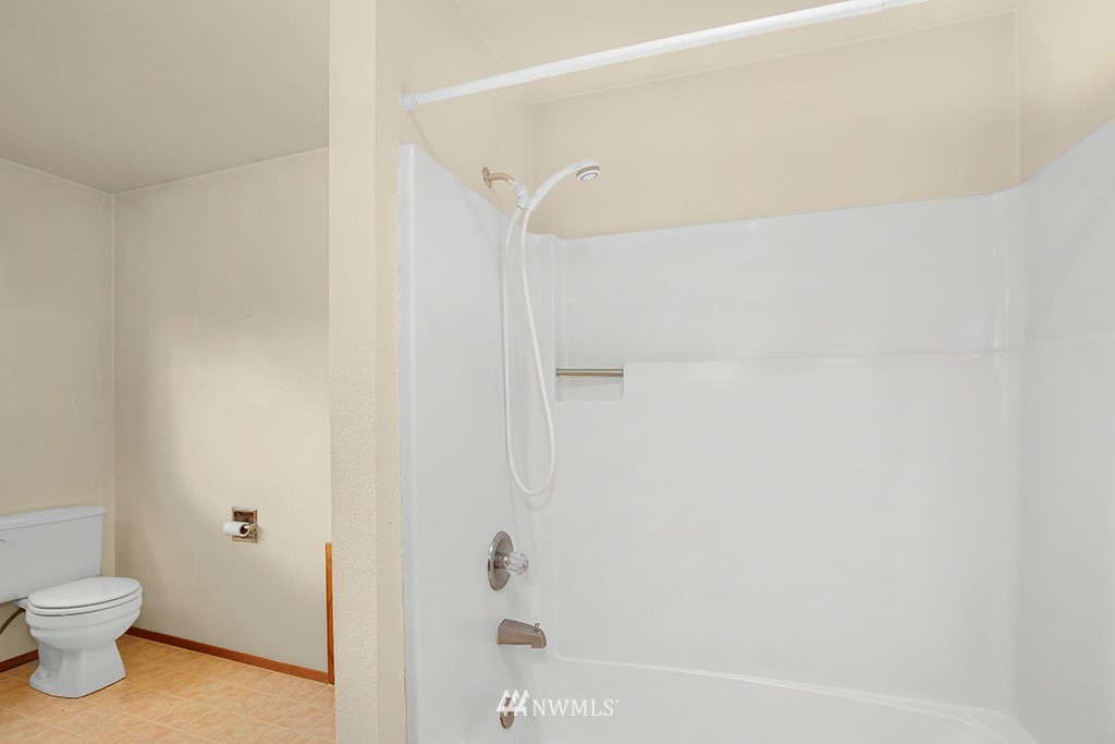 22526 14th Place West Bothell, WA 98021 - Photo 6 of 25 a bathroom with a shower and a toilet