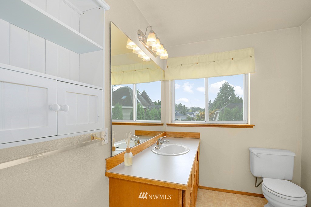 22526 14th Place West Bothell, WA 98021 - Photo 7 of 25 a living room with a large window and furniture