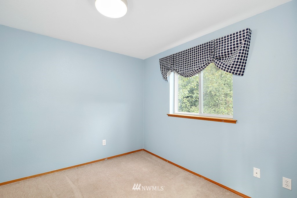 22526 14th Place West Bothell, WA 98021 - Photo 8 of 25 an empty room with windows