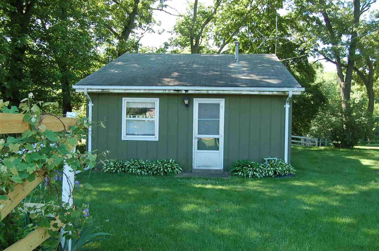 2623 South Snyder Road Oregon, IL 61061 - Photo 1 of 23 a view of a house with a yard