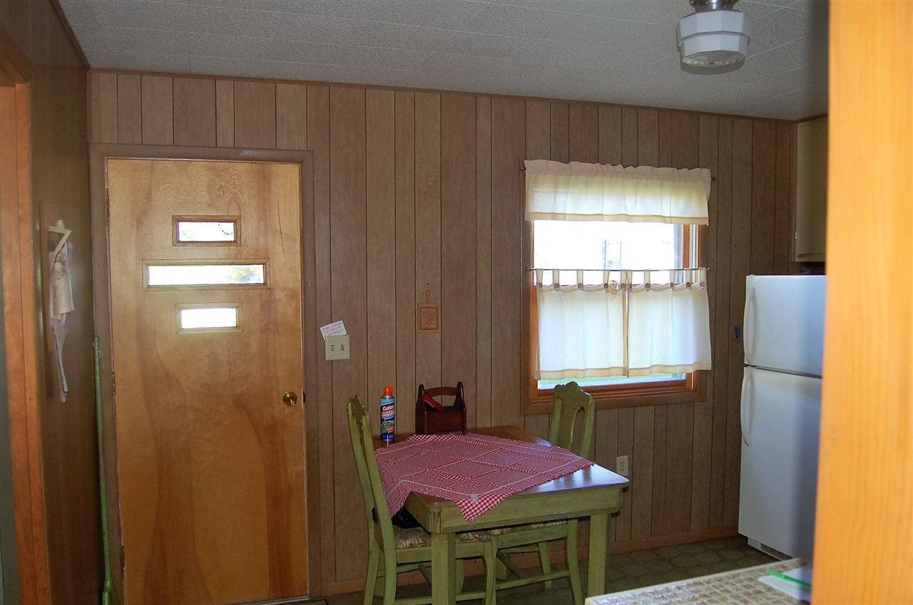 2623 South Snyder Road Oregon, IL 61061 - Photo 17 of 23 a bedroom with a bed and a window