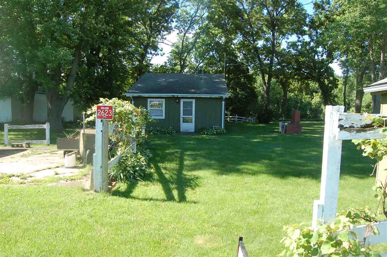 2623 South Snyder Road Oregon, IL 61061 - Photo 20 of 23 a view of a house with a yard porch and sitting area
