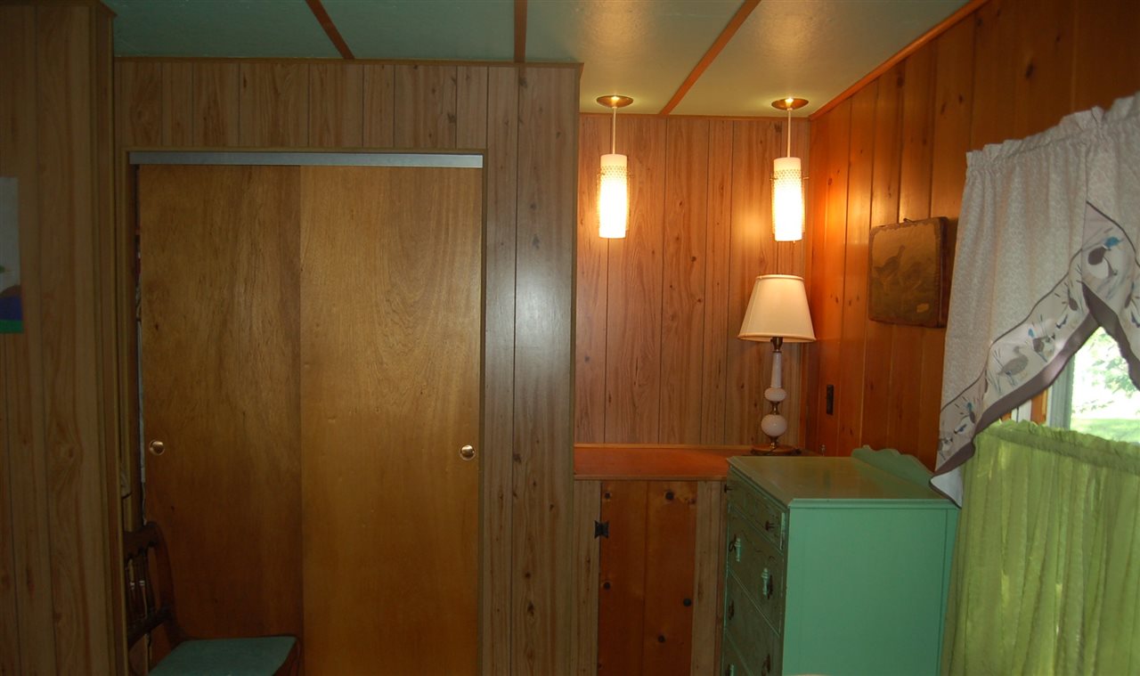 2623 South Snyder Road Oregon, IL 61061 - Photo 23 of 23 a bathroom with a shower and a mirror