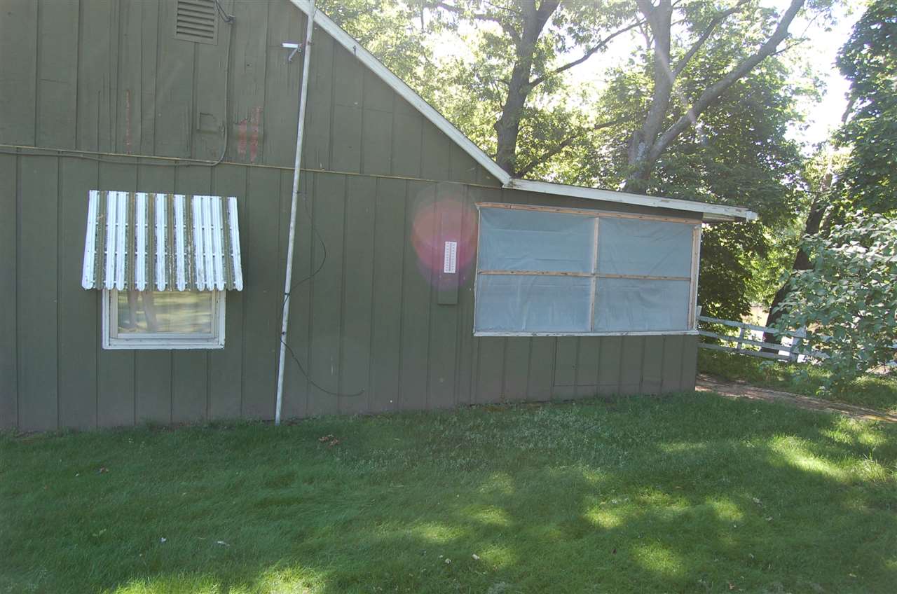 2623 South Snyder Road Oregon, IL 61061 - Photo 5 of 23 a backyard of a house with lots of green space