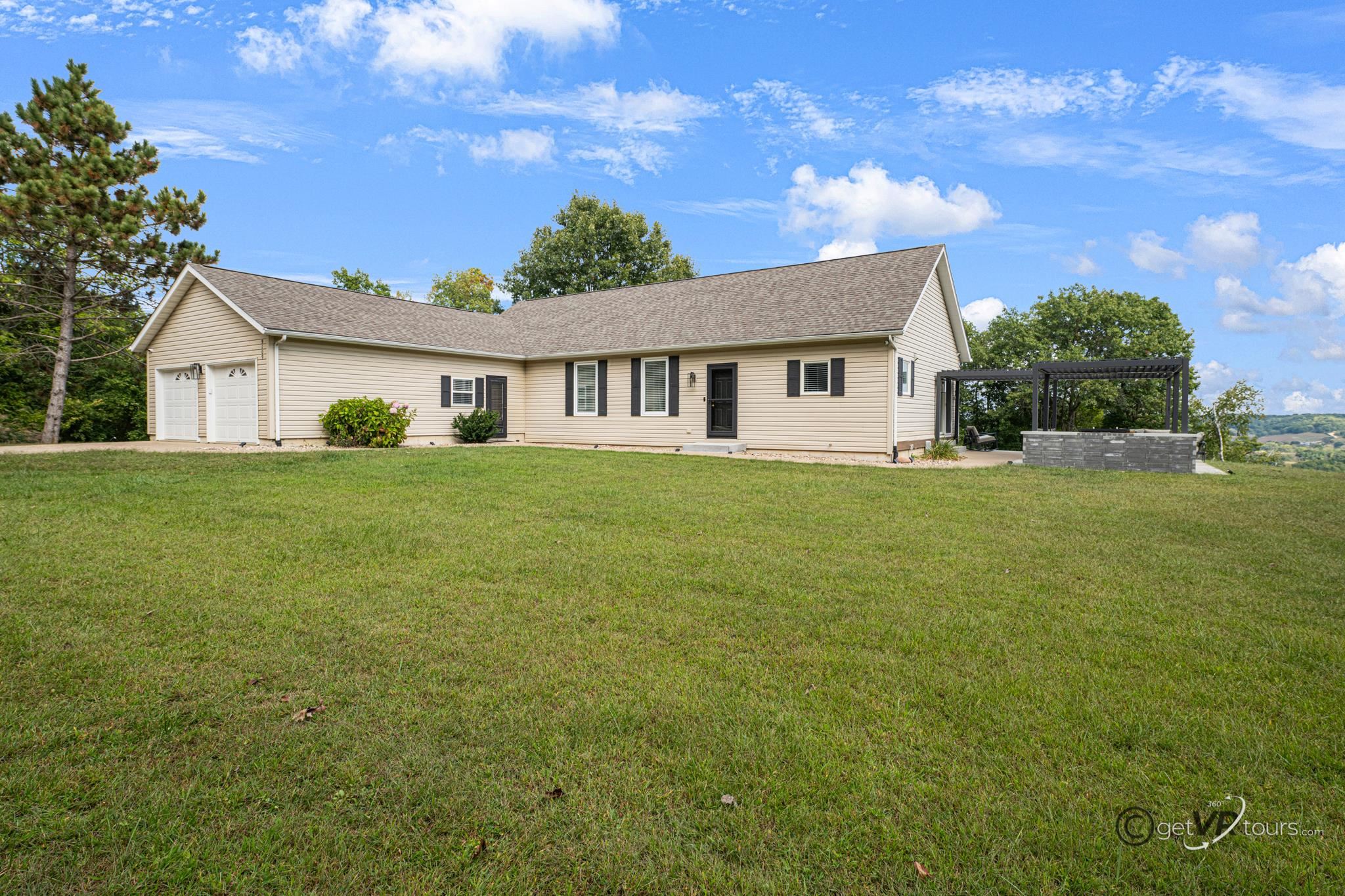 9109 South Hanover Hill Road Hanover, IL 61041 - Photo 2 of 42 front view of a house with a yard
