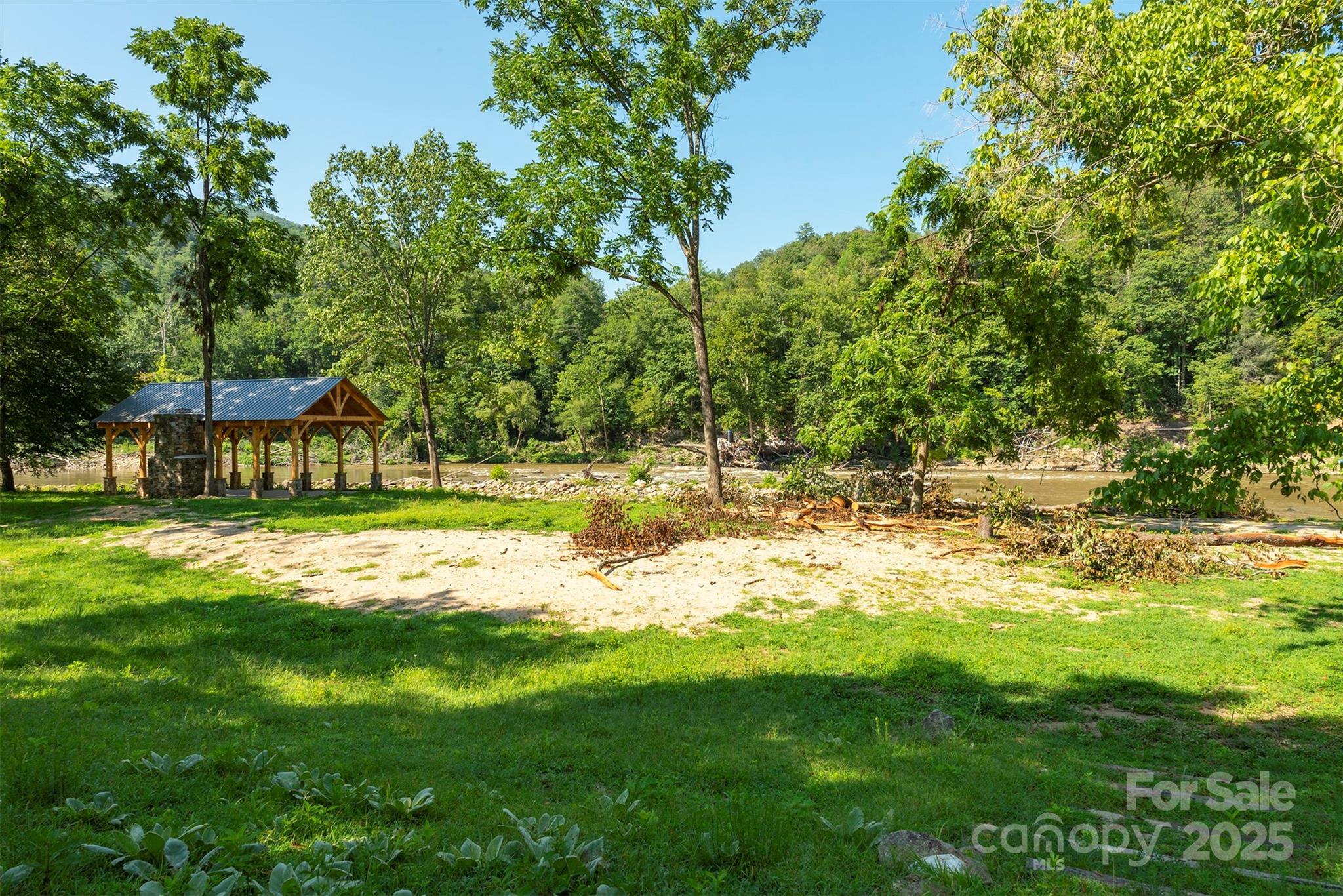 230 White Rapid Road Marshall, NC 28753 - Photo 18 of 29 a backyard of a house with lots of green space