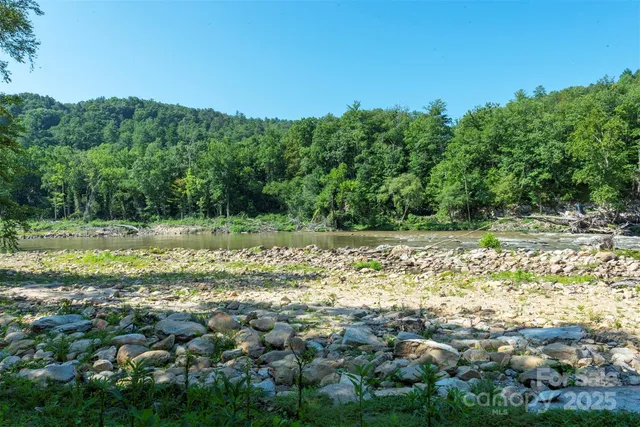 a view of a pool with a yard