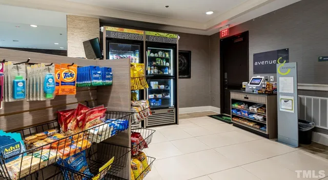 a view of a dining room with furniture and a livingroom